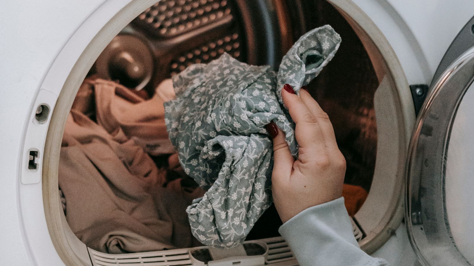 Modern front-load washing machine without an agitator in a bright laundry room