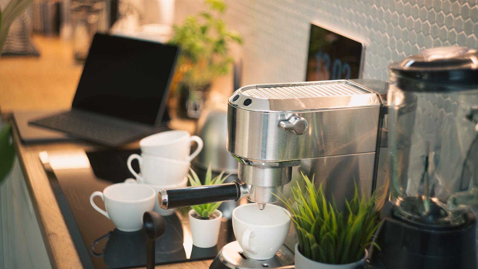 Coordinated countertop kitchen appliances arranged neatly with matching finish