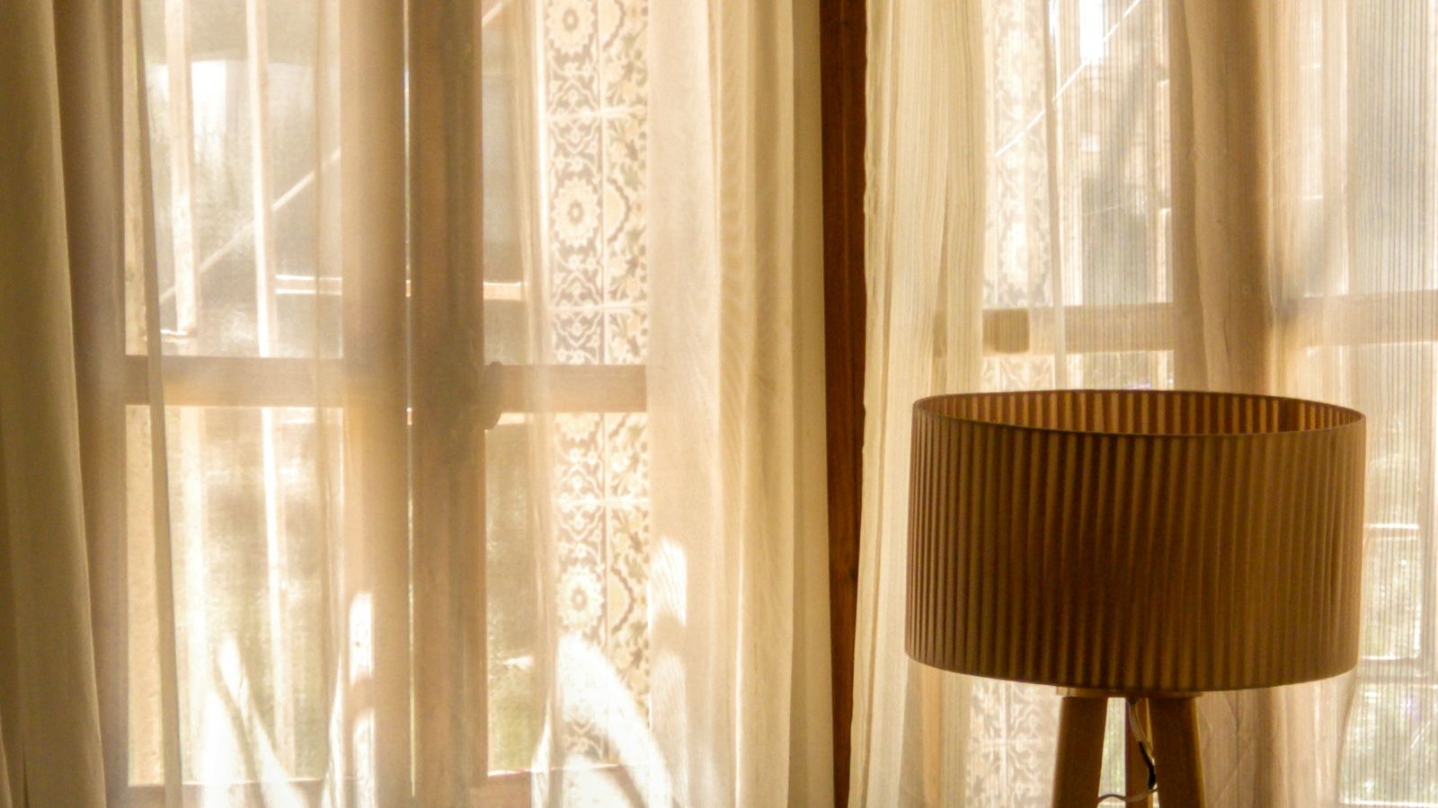 Doorway curtain hanging over a closet opening as a soft alternative to a solid door