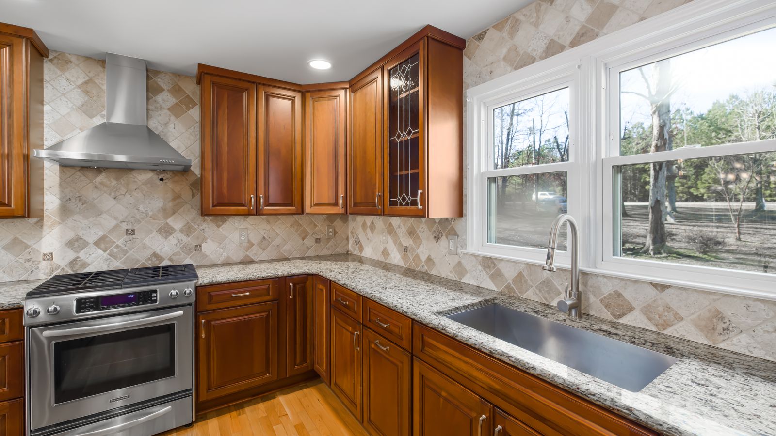 Modern kitchen sink area during a budget renovation planning session