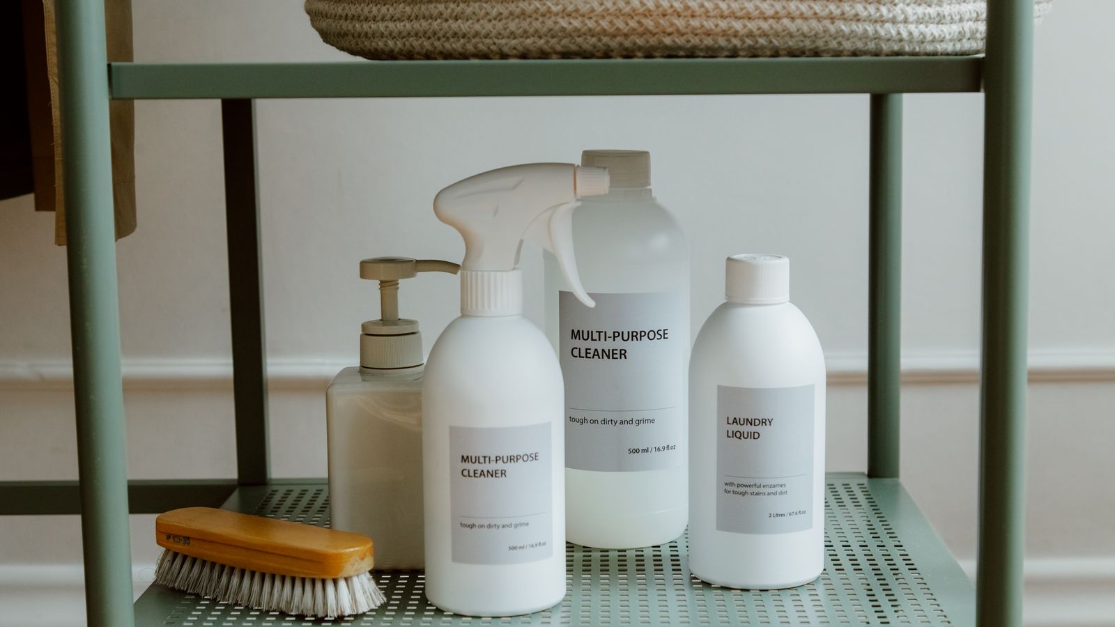 Cleaning and laundry products organized on a metal storage shelf