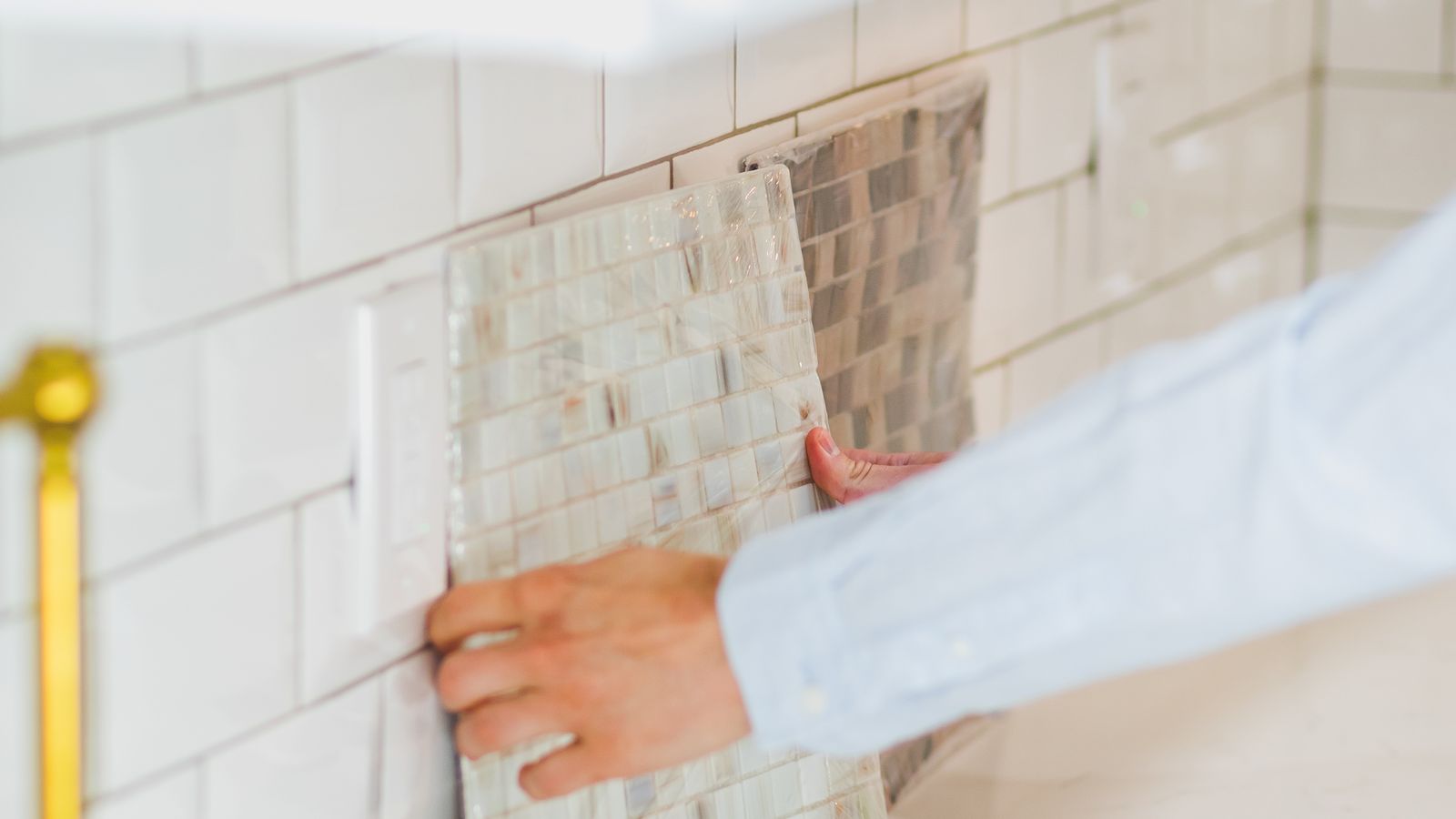 Cutting a peel and stick backsplash tile to fit around a kitchen outlet