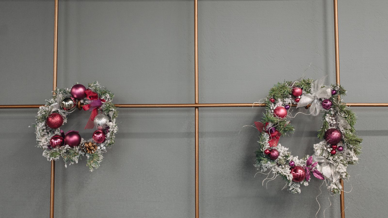 Fresh green wreath hanging on a wall as part of a home decor accent display