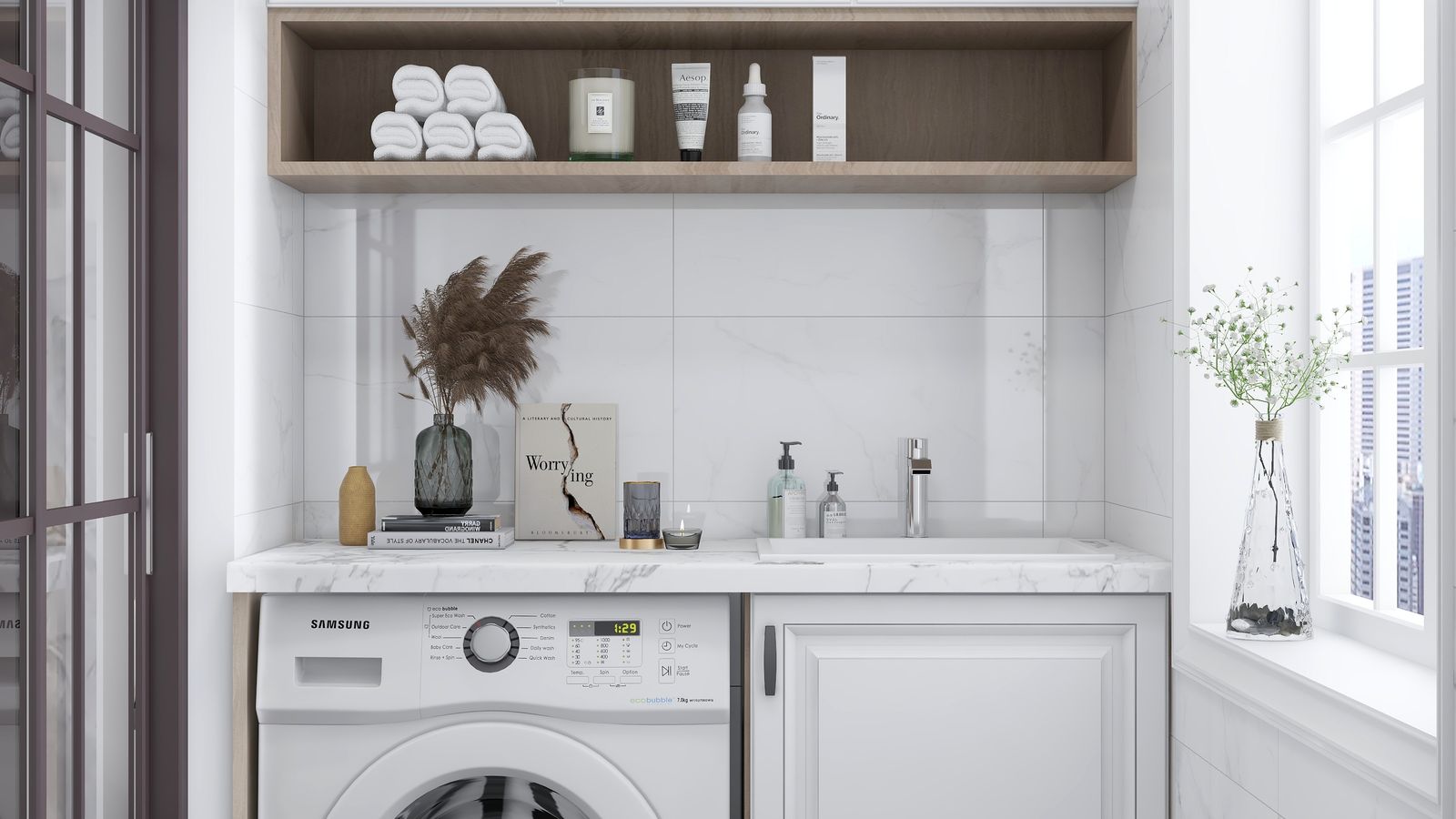 Bright laundry room with washer, dryer, storage shelving, and a rug in front of the machines